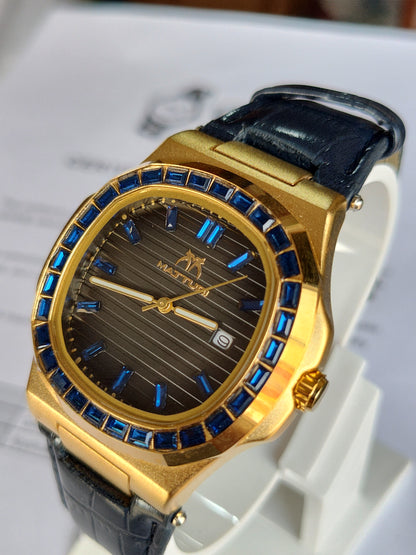 Mattugi Luxury Baguette Blue Crystal Bezel Watch - Gold Case with Premium Black Leather Strap