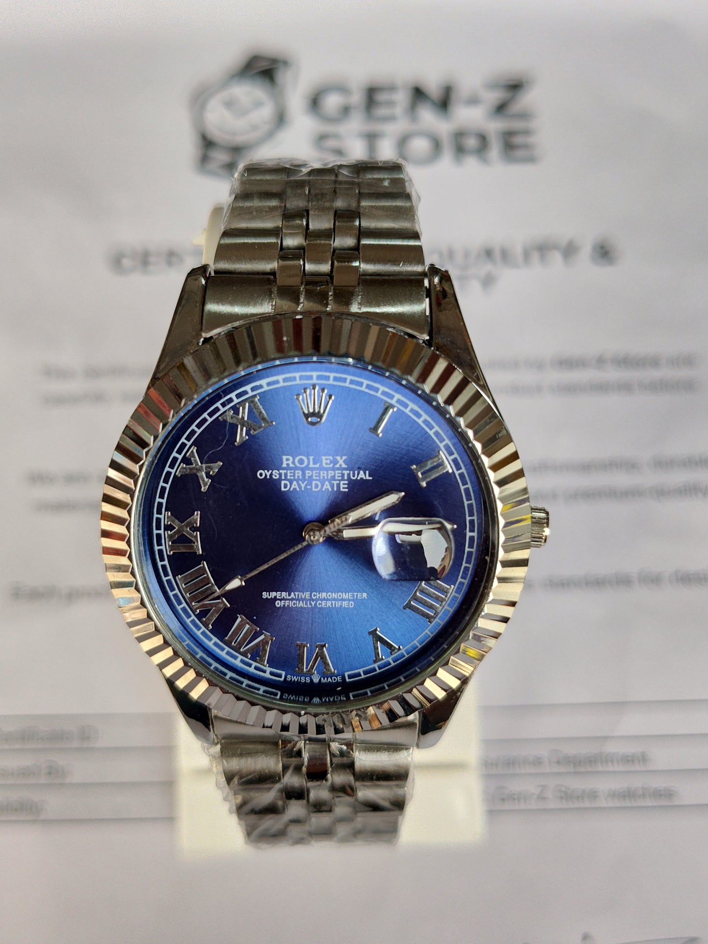 "ROLEX — Oyster Perpetual — Day-Date — Superlative Chronometer — Officially Certified — Swiss Made"